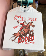 Load image into Gallery viewer, North Pole Rodeo Tee or Crewneck