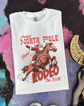 Load image into Gallery viewer, North Pole Rodeo Tee or Crewneck