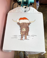 Load image into Gallery viewer, Highland Cow Santa Hat Tee or Crewneck