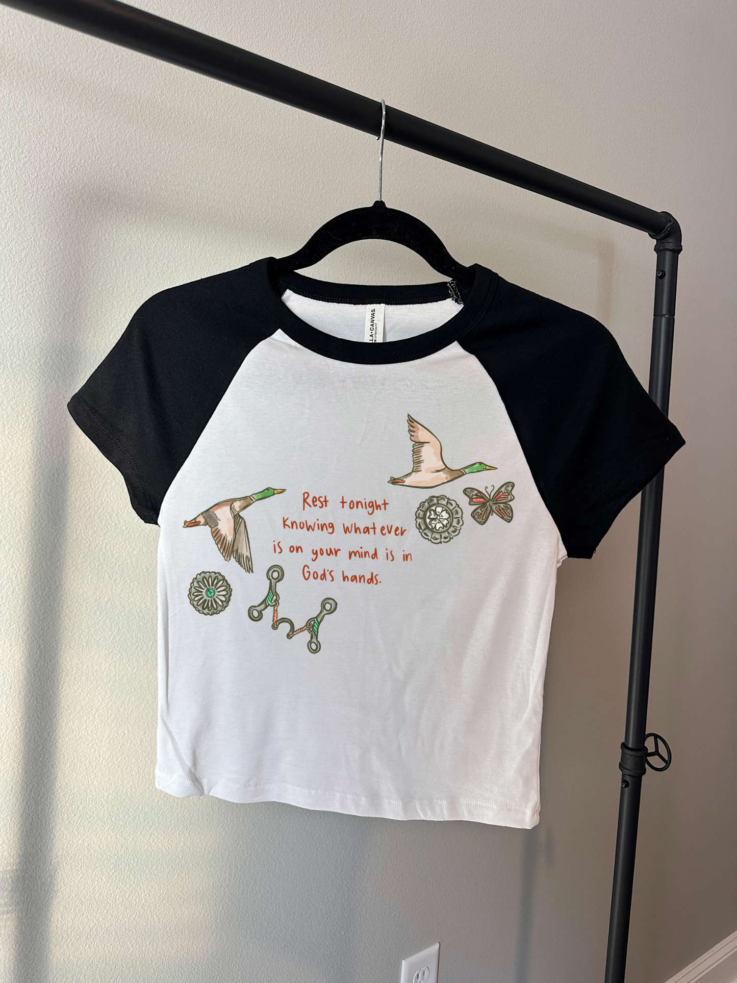 In God’s Hands Baby Tee