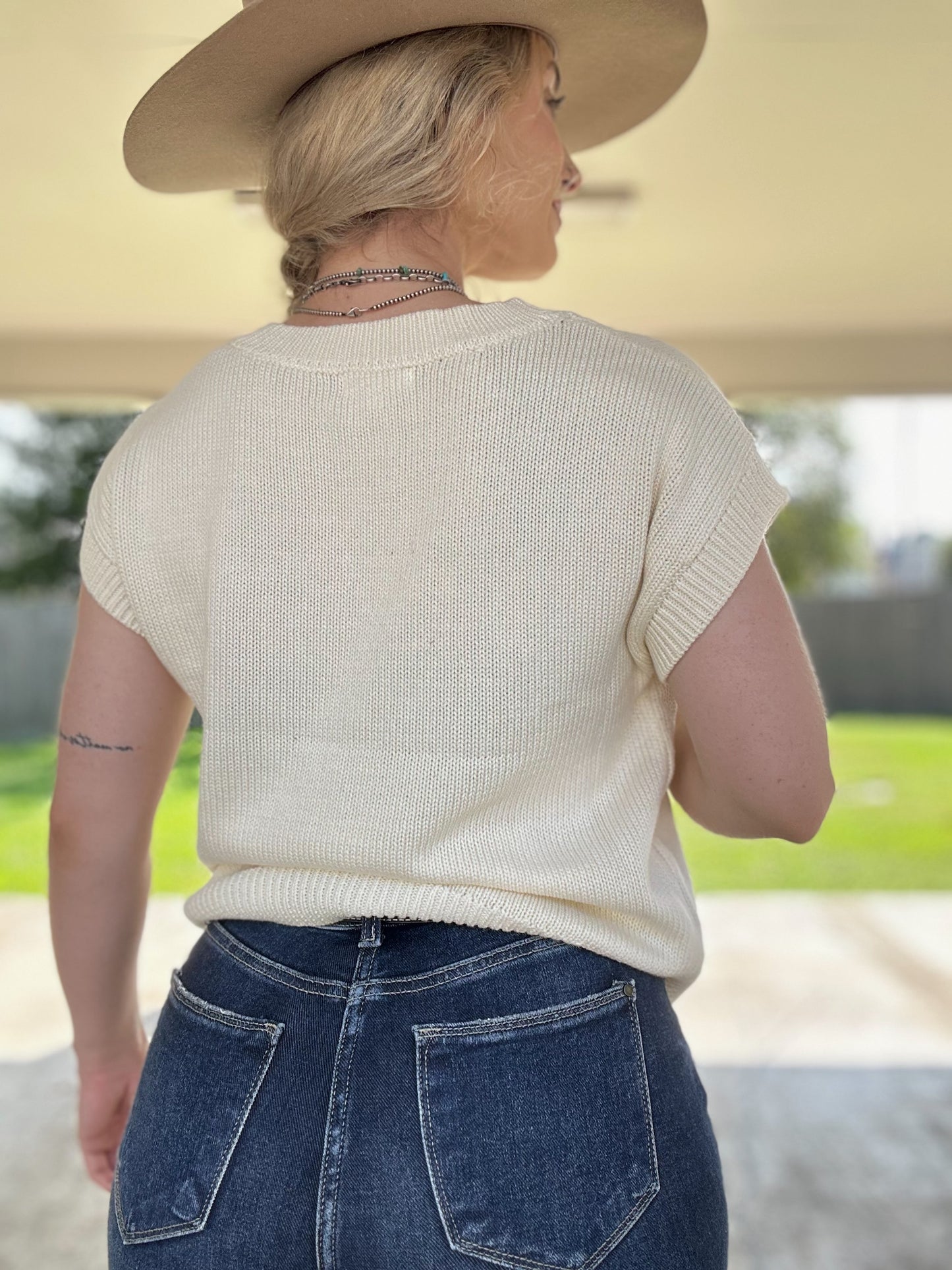 Boots & Bows Sleeveless Sweater