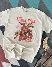Load image into Gallery viewer, North Pole Rodeo Tee or Crewneck
