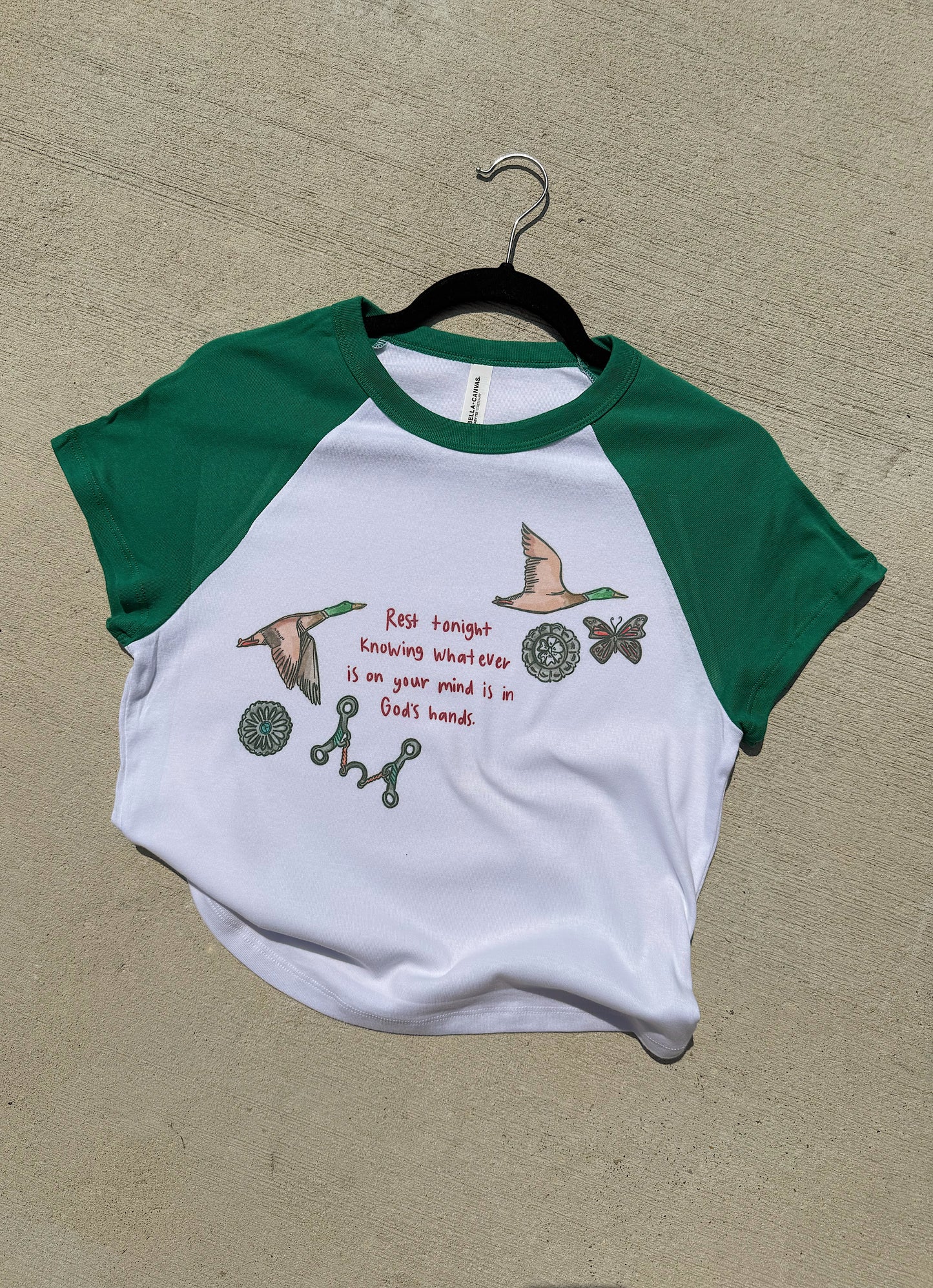 In God’s Hands Baby Tee