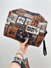 Load image into Gallery viewer, Cowboy Collage Toiletry Bag
