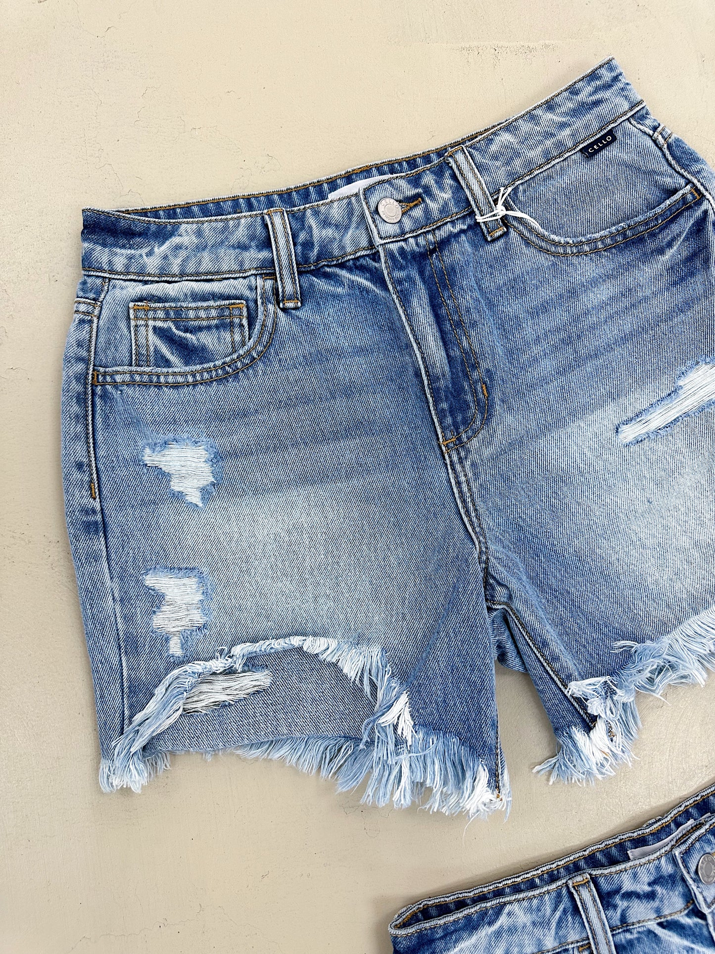 Uneven Hem Denim Shorts