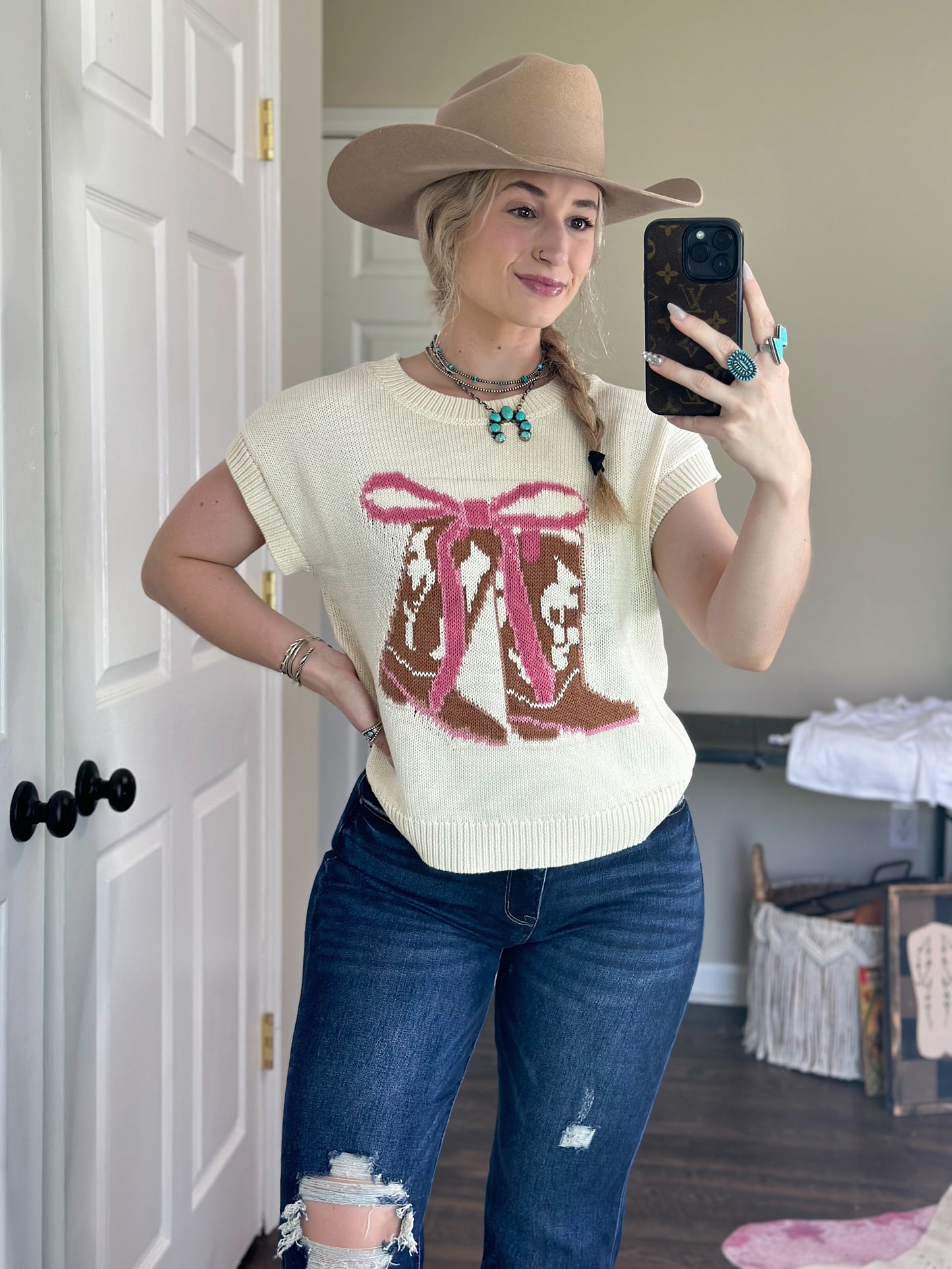 Boots & Bows Sleeveless Sweater
