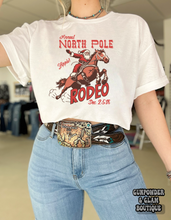 Load image into Gallery viewer, North Pole Rodeo Tee or Crewneck
