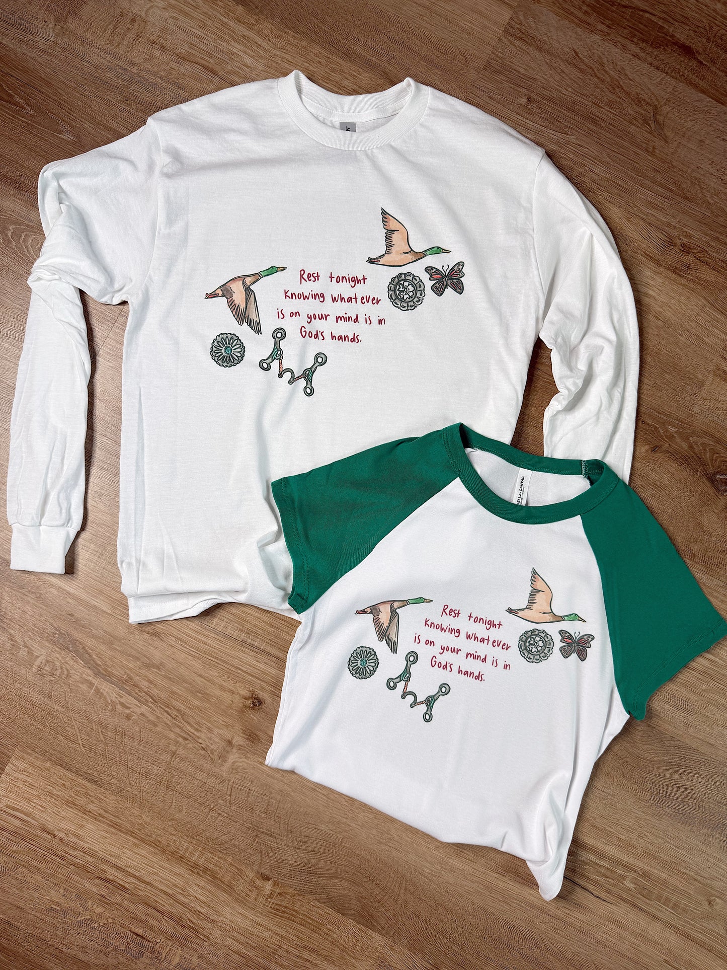 In God’s Hands Baby Tee