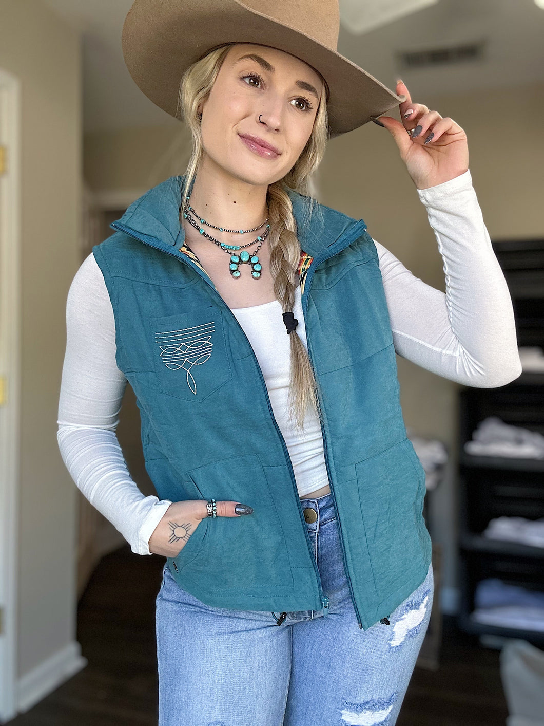 Turquoise Boot Stitch Puffer Vest