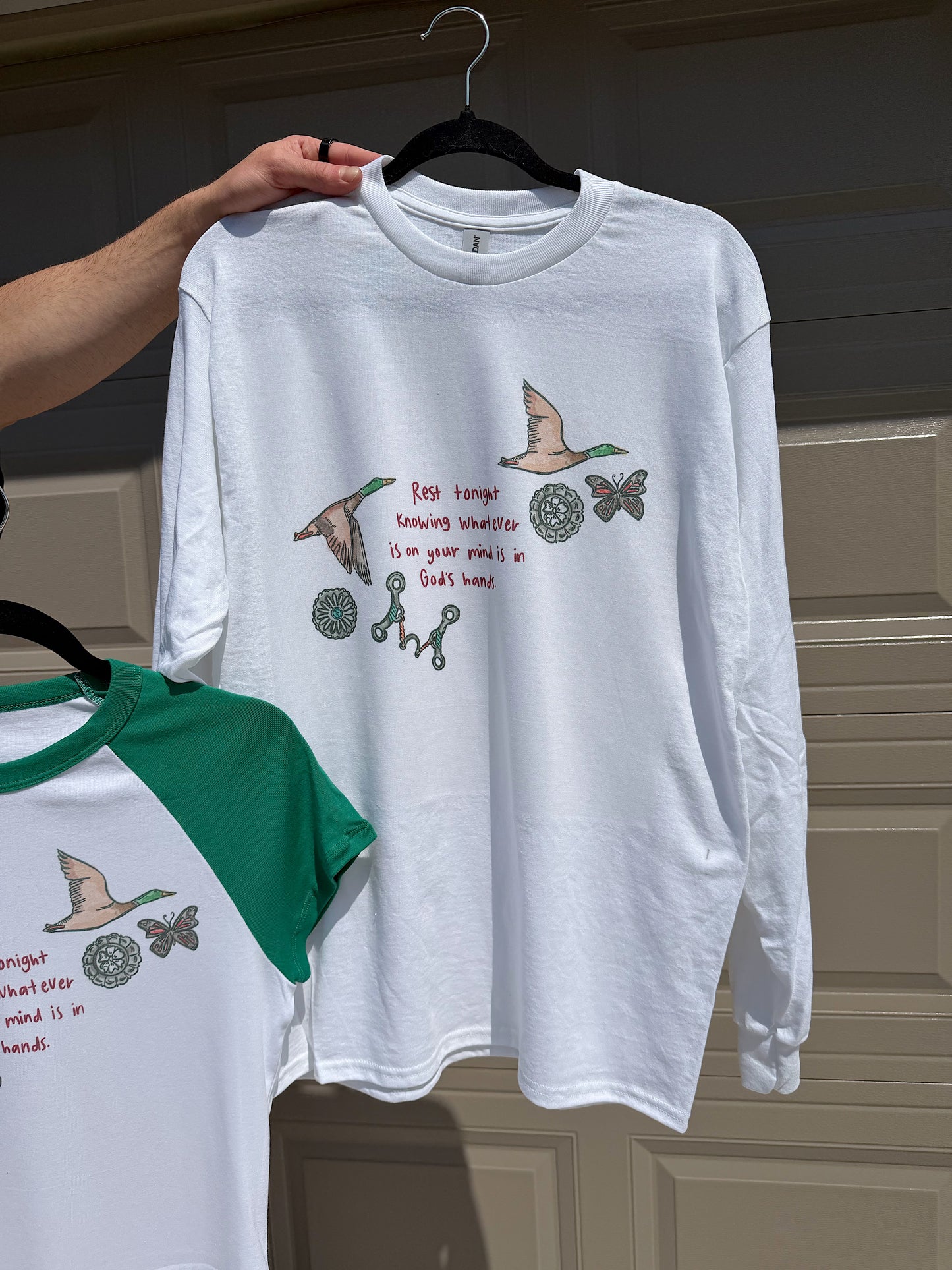 In God’s Hands Long Sleeve Tee